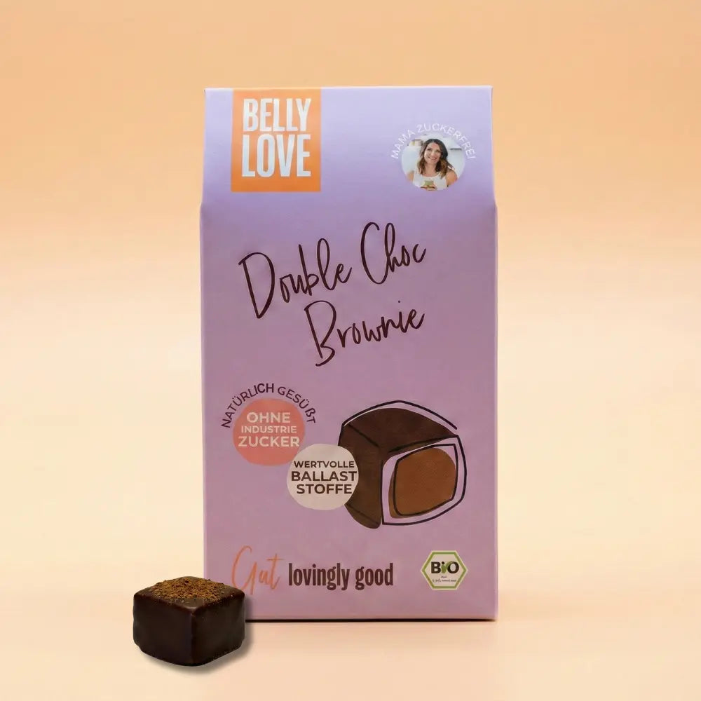 Produktverpackung Brownie Praline mit dunkler Praline vor der Verpackung